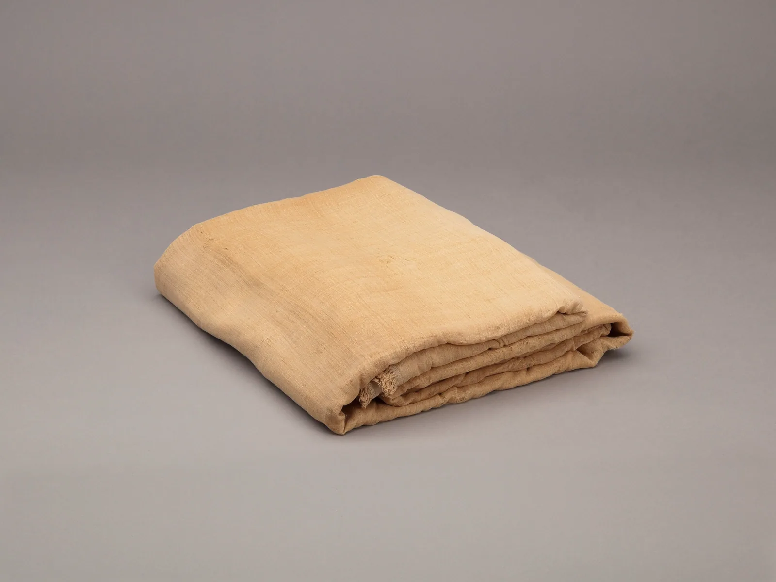 Folded natural linen showing medium weave (conceptual image)